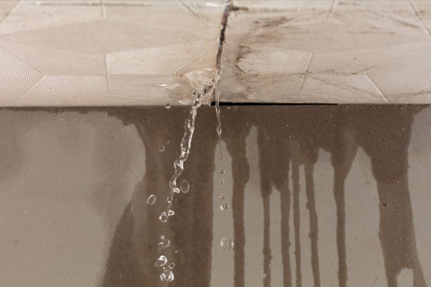 Professional Flood Damage Cleanup technician working in Byram, CT